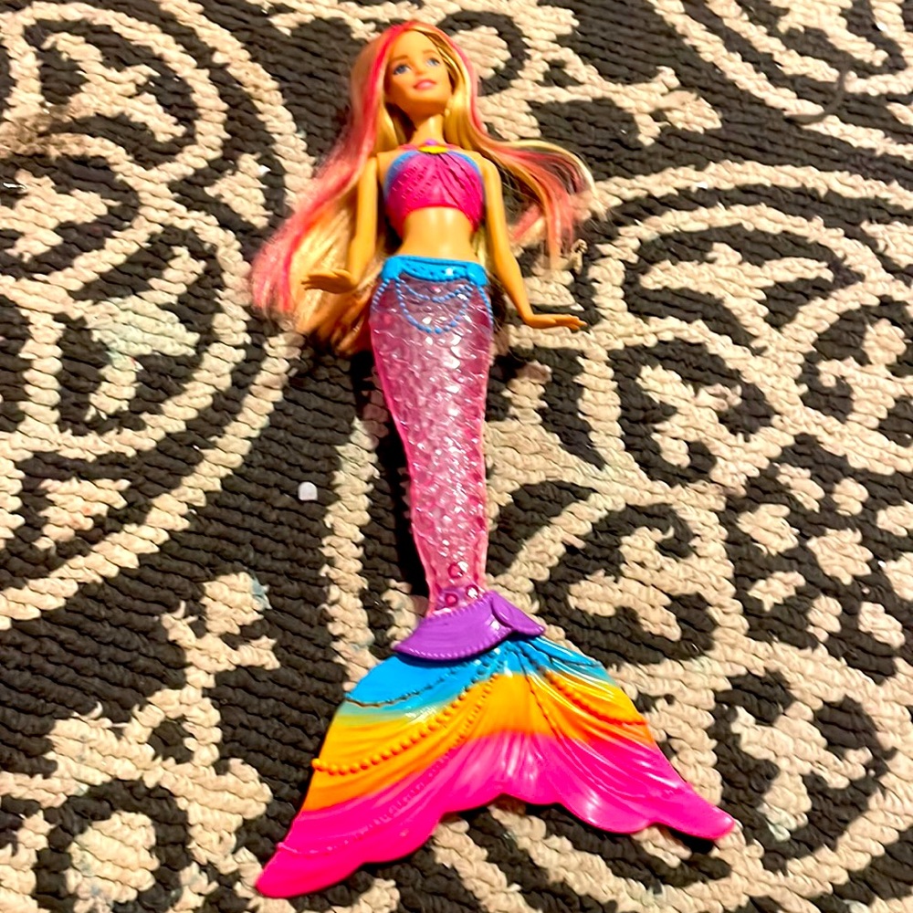 Selling a mermaid Barbie doll